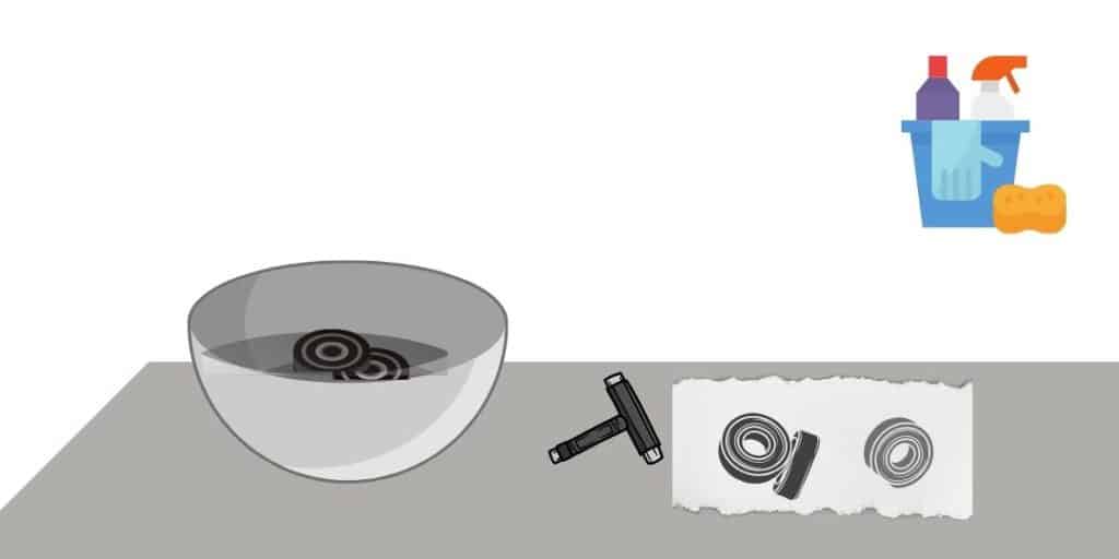 clean skateboard bearings using bowl, towel, oil ,lube