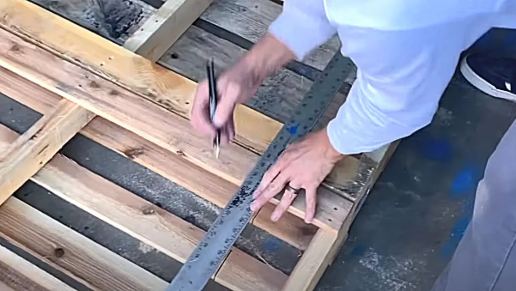 measuring wood to build a grind box for skateboarding 