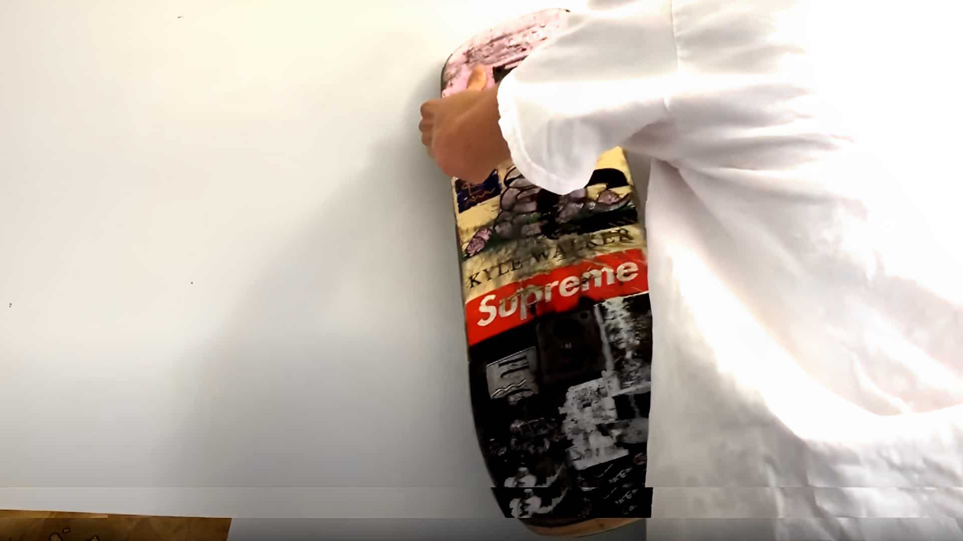 placement on wall to hang a skateboard
